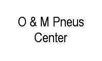 Logo O & M Pneus Center em Senador Camará