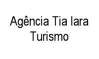 Logo Agência Tia Iara Turismo em Auxiliadora