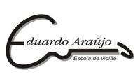 Logo A Escola de Violão Eduardo Araújo em Lourdes